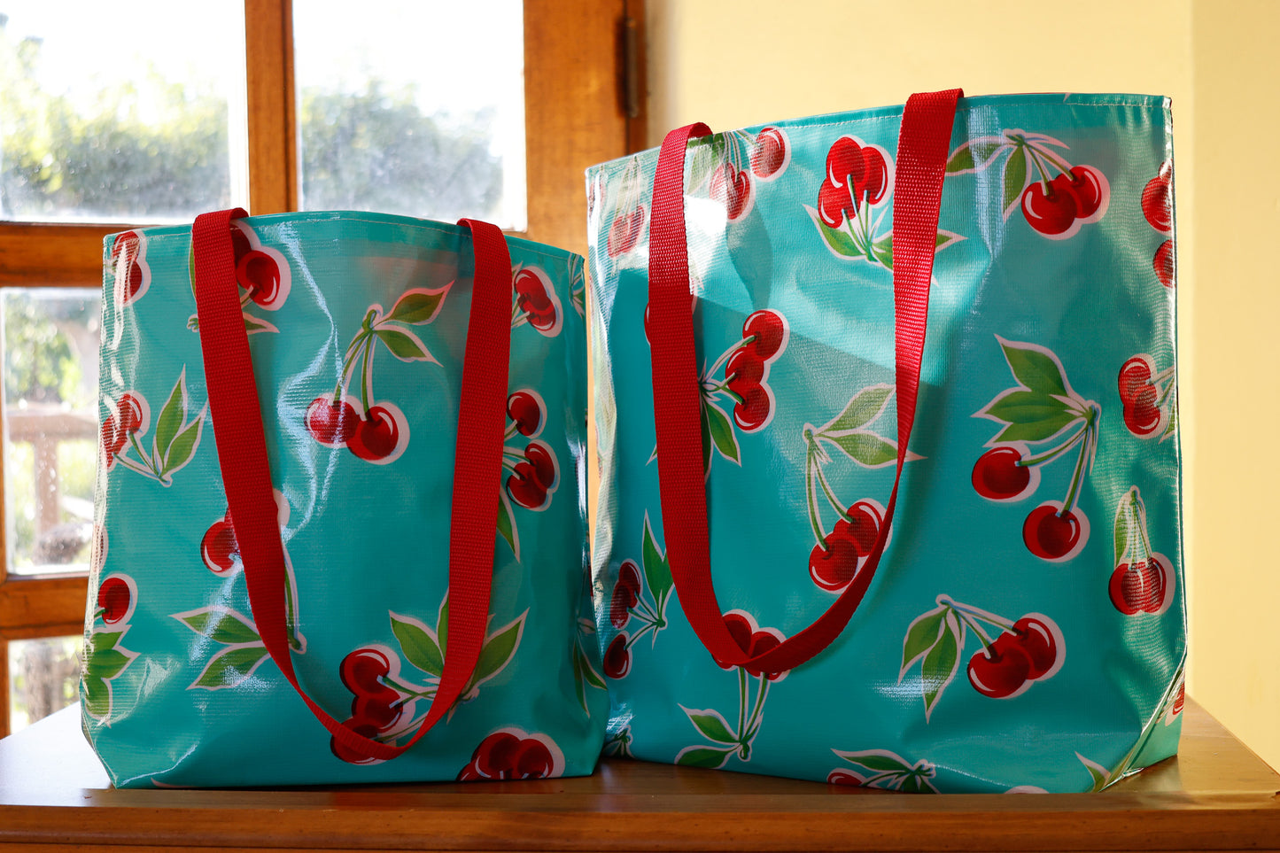 Reversible Oilcloth Totebag - Turquoise Cherry with White on Red Polka - Two Sizes